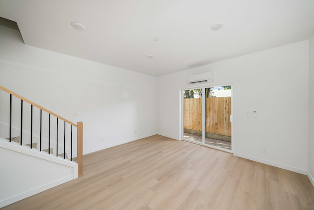 Living room wood floors with sliding doors